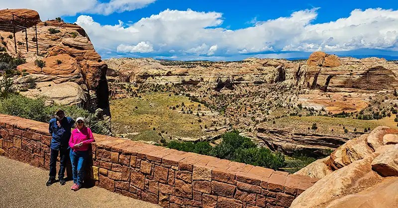 David and Linda Aksomitis in Utah with red rock scenery.